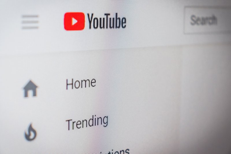 youtube-logo-search-bar-and-menu-displayed-on-a-screen