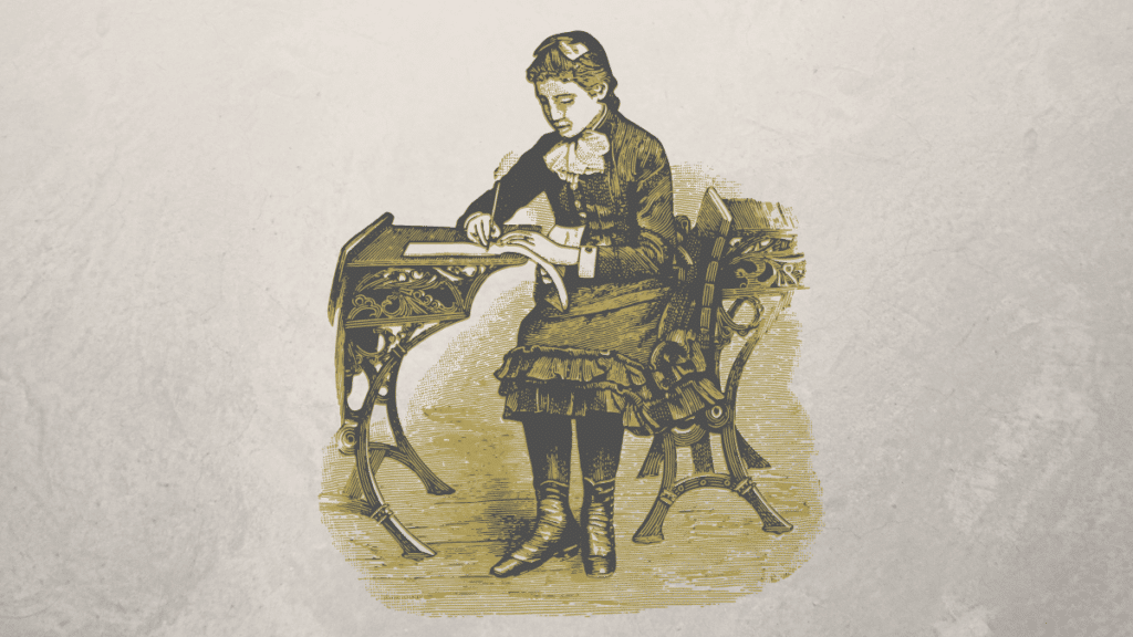 seorang pria duduk di kursi sambil menulis buku