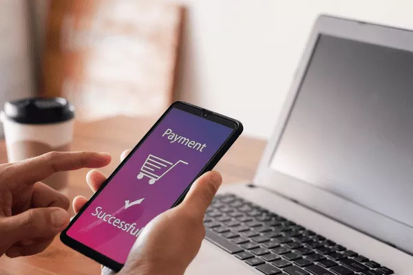 teléfono que muestra compras aprobadas