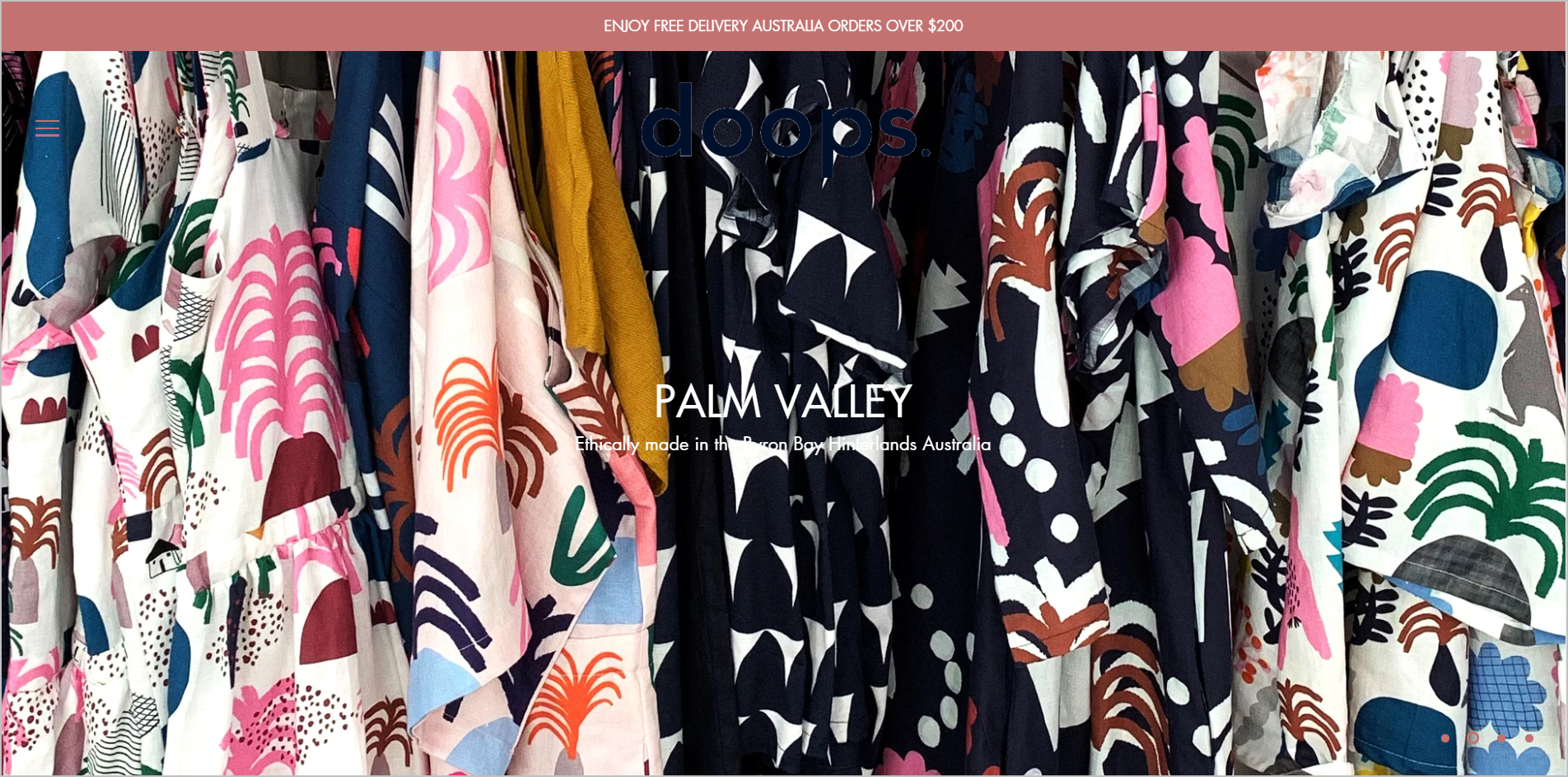 DoopsDesigns.com Ana Sayfası trendy web design pitfalls - large background image that gets in the way of usability example - doops designs homepage above the fold