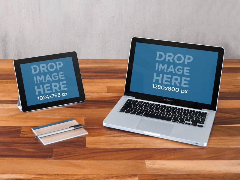 Macbook Pro 和 iPad 坐在木桌模型上