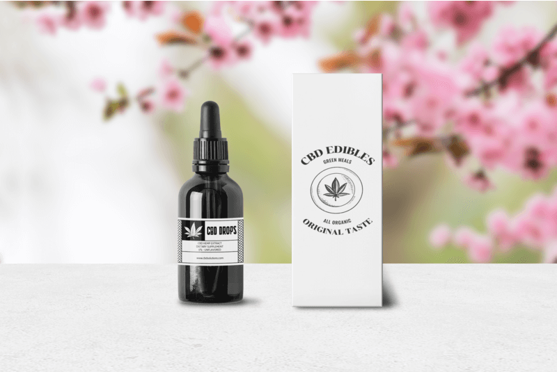 Modell einer Pipette und ihrer Schachtel mit Cbd-Logo