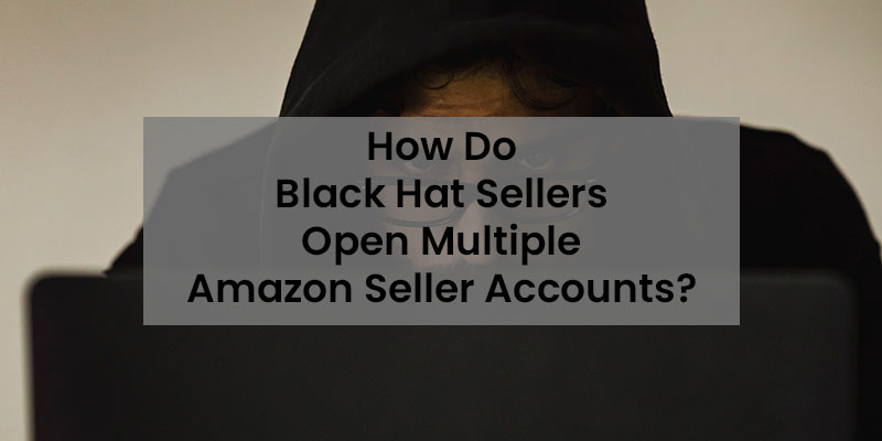 穿着黑色连帽衫的男人在他的黑色笔记本电脑上工作